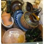 A box containing a collection of studio pottery wares to include Celtic pottery, Cornwall jugs,