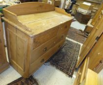 A Victorian pine dressing chest with three-quarter galleried top above two short and two long