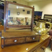 A mahogany dressing mirror and brass water jug