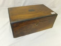 A Victorian mahogany and brass bound writing slope