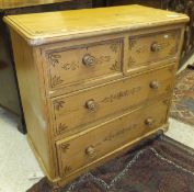 A Victorian painted pine chest of two short and two long drawers on a plinth base