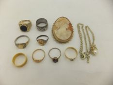A collection of jewellery to include two 9 carat gold rings, a 22 carat gold ring, an 18 carat