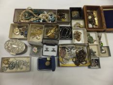 A quantity of various costume jewellery to include necklaces, earrings, bracelets, brooches,
