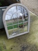 An outdoor mirror of arched form*