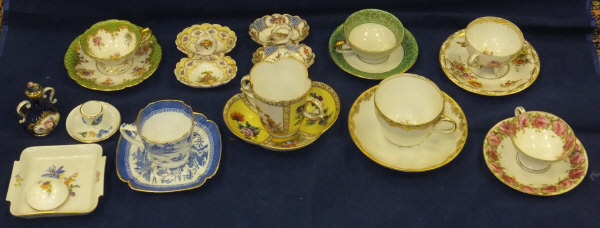 A collection of five Dresden cabinet cups and saucers, a Meissen gilt decorated cup and saucer, a