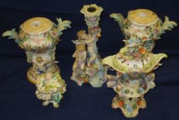 A pair of Meissen relief work decorated vase shaped lamp bases, a Dresden porcelain candlestick /