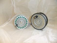 A Hardy "St Aidan" 3¾" fly reel with spare spool,