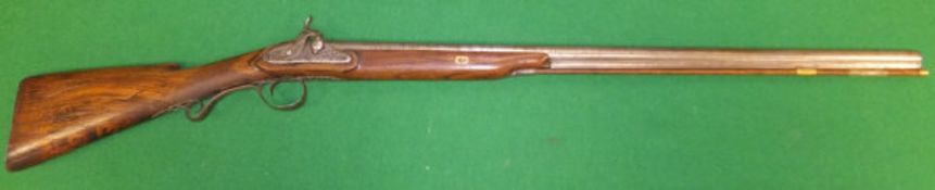A 19th Century muzzle loading hammer action rifle with single 33" barrel,
