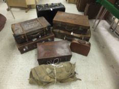 A collection of six vintage leather suitcases,