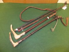 An antler handled riding crop with plaited leather shaft and plated ferrule stamped "Swaine Made in