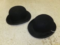 Two black bowler hats, both by Tress & Co.