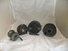 Four assorted fishing reels, to include an Allcocks "Easicast" alloy spinning reel,