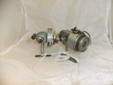 Two scratch-built aluminium thread line fishing reels,