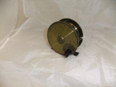 A 3½" bronzed brass plate wind salmon fly reel