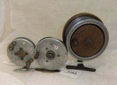 Three scratch-built centre pin fishing reels,