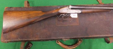 A Coggswell & Harrison 12 bore shotgun, double barrel, side by side, side lock ejector, 30" barrels,