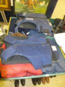 Four boxes of assorted horse blankets, body armour, numnahs, jump boots, various bits,