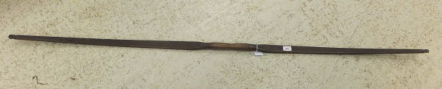 A single piece hand-carved yew wood longbow