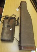 A leather and canvas leg o' mutton gun case,