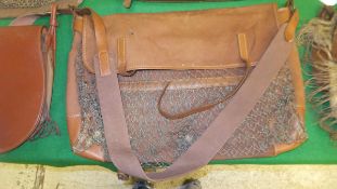 A leather and canvas game bag