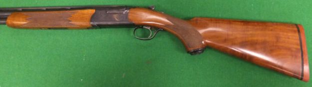 A Ruger 20 bore shotgun, double barrel, over and under, with semi-pistol grip, multi-choke,