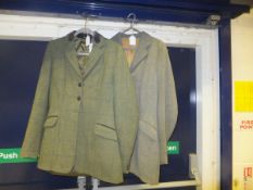Two tweed riding jackets, one by Alexander James of Pendlebury,