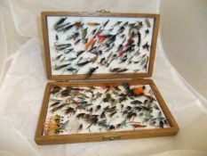 A collection of sea trout and salmon fishing flies,