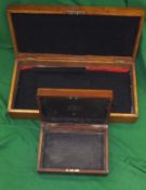 A Leath & Ross mahogany pistol case with part black leather interior,
