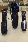 Three golf bags containing various golf clubs, together with a quantity of various camping chairs,