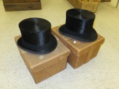 Two black silk top hats (one by Moss Bros and the other by Mrs White),