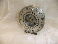 A 4½" "Aerial" style fishing reel with narrow drum,