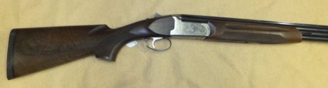 A Bettinsoli 20 bore shotgun, double barrel, over and under, ejector, chokes and multi-grip,