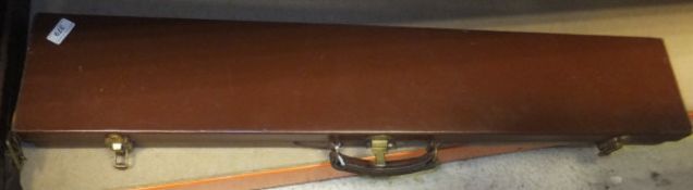 A leather and brass bound gun motor case