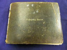 An early to mid 20th Century leather bound "fishing book", circa 1917-1954,