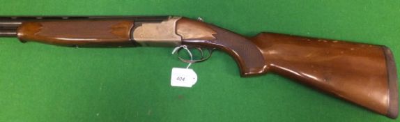 A Lamber 12 bore shotgun, double barrel, over and under, ejector, with semi-pistol grip,