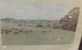 AFTER CECIL ALDIN "Huntsmen and hounds in a landscape", two colour prints,