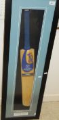 A Surrey County Cricket Club Kookaburra cricket bat, signed by the players,