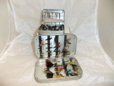 Two Wheatley alloy cases, one containing magna strips and a selection of salmon flies,