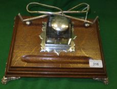 An oak and silver plated inkstand,