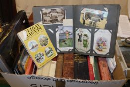 Two boxes containing a collection of books, stamps, etc, to include two albums of first day covers,