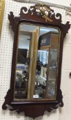 An 18th Century style mahogany framed and gilt decorated pier wall mirror,