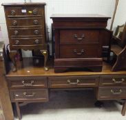 A modern mahogany dwarf two drawer bedside chest,