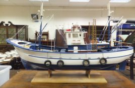 A large model fishing boat on stand from Connemara