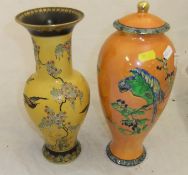 A Carlton ware vase and cover decorated with parrots on a mottled orange lustre ground, No.