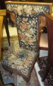 A mahogany framed prie a dieu chair with woolwork seat and back,