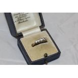 An 18 carat gold five stone set ring