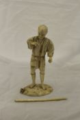 A 19th Century Japanese Meiji Period carved ivory okimono as a man with staff CONDITION