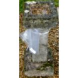 A rectangular composite stone bird bath on square sectioned tapering column to square base