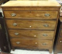 A 19th Century mahogany chest of four long drawers with brass drop handles and escutcheons,