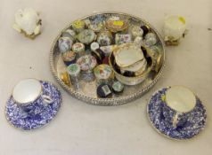 A pair of Royal Crown Derby blue and white and gilt decorated coffee cans and saucers,